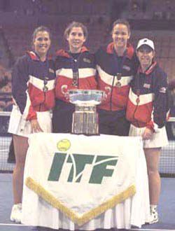 Fed Cup 2000: Capriati, Seles, Davenport, Raymond with Fed Cup 2000 trophy.